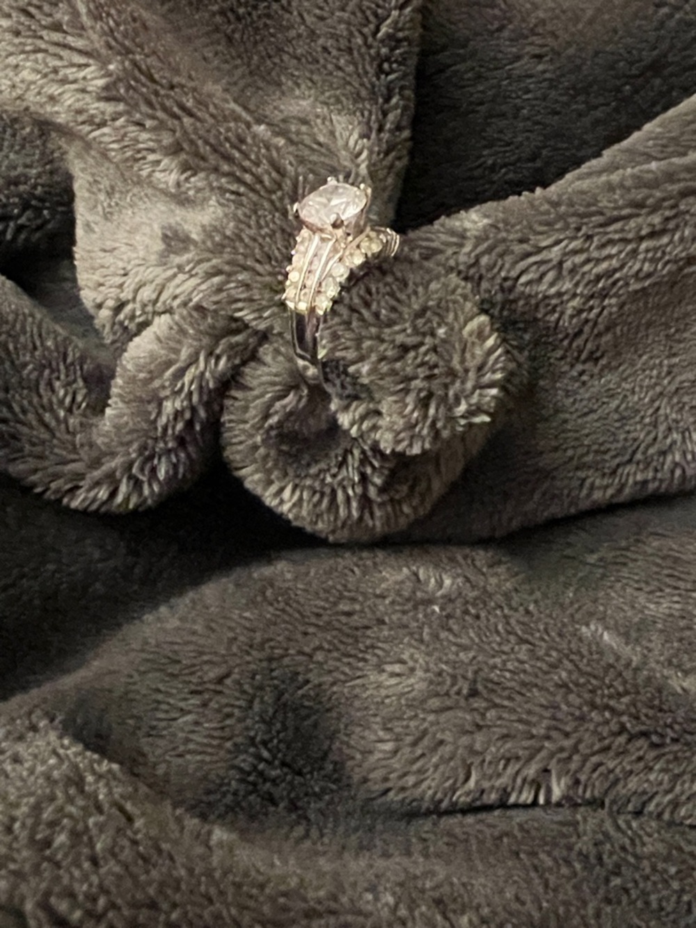 Sparkling Solitaire-Style Silver Ring with Side Stones